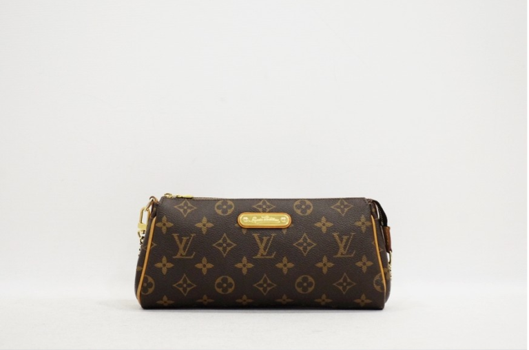 Louis Vuitton Eva Clutch Handbag in Monogram